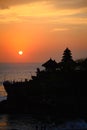 Hindu temple Tanah Lot in Bali at Sunset Royalty Free Stock Photo