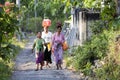 Hindu women carry on their heads offerings, - Nusa Penida, Indonesia