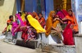 Hindu women dressed in colorful sari in India