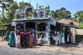 Hindu worshippers gather around a small Hindu Kovil in northern Sri Lanka.