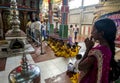 Hindu worshippers pray inside the Koneswaram Kovil during a Puja ceremony.