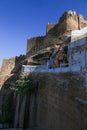 Hinduism temple and Mehrangarh Fort facade Royalty Free Stock Photo