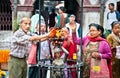 Hindus and Buddhists devotees are purification by fire on enrance in temple, Kathmandu, Nepal.