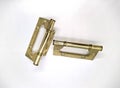 hinges for doors of gold color on a white background photo. Royalty Free Stock Photo