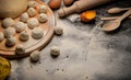 Hinkali homemade. Flour, eggs, dough on a black background