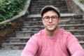 Hip ethnic man wearing eyeglasses and hat Royalty Free Stock Photo