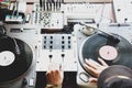Hip-hop DJ at home studio is spinning records Royalty Free Stock Photo