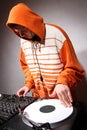 Hip hop DJ scratching the music record