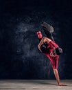 Hip-hop style dancer performs breakdance acrobatic elements. Royalty Free Stock Photo