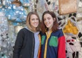 Hip seventeen yearold girl and her forty-five yearold mother posing in the Magic Garden of Isaiah Zagar, Philadelphia Royalty Free Stock Photo