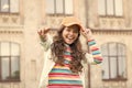 Hip and stylish. pretty child smiling outdoor. kid beauty and fashion. cheerful school girl wear cap. teen in casual Royalty Free Stock Photo