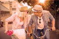 Hip young couple going for a bike ride