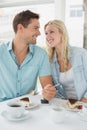 Hip young couple having desert and coffee together Royalty Free Stock Photo