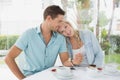 Hip young couple having desert and coffee together Royalty Free Stock Photo