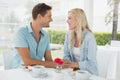 Hip young couple having desert and coffee together Royalty Free Stock Photo