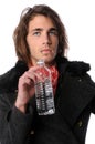Hip Young Man Holding Bottled Water Royalty Free Stock Photo