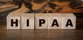 HIPAA on Wood cubes. Health Insurance Portability Accountability Act. concept