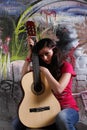 Hippie girl with guitar Royalty Free Stock Photo