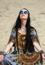 Hippie girl meditates Royalty Free Stock Photo