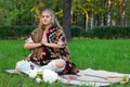 Hippie girl meditation yoga in the park  vintage rabbit pet Royalty Free Stock Photo