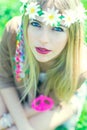 hippie girl with necklace with peace sign Royalty Free Stock Photo