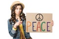 Hippie girl pointing with finger at placard with inscription isolated on white Royalty Free Stock Photo