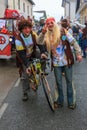 Hippie riding a bike and spreading love and peace