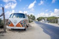 Hippie Volkswagen kombi Vintage car on the beach redesigned as a bar