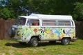 Hippie Volkswagen 1970 VW camper van with love and groovy artwork hand painted on the outside