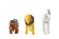 Hippo, lion and zebra mini figures isolated on white background. Front view. Plastic animal toy. Full depth of field. Clipping