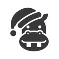 Hippo wearing santa hat silhouette icon design Royalty Free Stock Photo