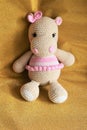 Hippopotamus crochet Vintage background Toy for kids Hippo knitting Handmade Hippie soft toy Cute woolen Hippie baby for children
