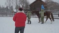 Hippotherapy for a child with cerebral palsy syndrome on a cold winter day