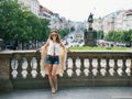 Hippy-looking woman tourist standing on Wenceslas Square, Prague Royalty Free Stock Photo