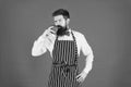 Hipster barista hold cup fresh brewed drip coffee. Coffee made by slowly pouring hot water through crushed beans in Royalty Free Stock Photo