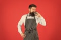 Hipster barista hold cup fresh brewed drip coffee. Coffee made by slowly pouring hot water through crushed beans in Royalty Free Stock Photo