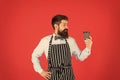 Hipster barista hold cup fresh brewed drip coffee. Making best coffee. Coffee made by slowly pouring hot water through Royalty Free Stock Photo