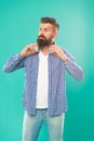 Hipster with beard listening music. Handsome music lover. Man in headphones. Streaming sites hippest and hottest around Royalty Free Stock Photo