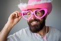 Hipster with beard and mustache in funny big eyeglasses. Happy man smile face. Handsome smiling young guy. Positive Royalty Free Stock Photo