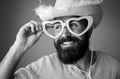 Hipster with beard and mustache in funny big eyeglasses. Happy man smile face. Handsome smiling young guy. Positive Royalty Free Stock Photo