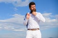 Hipster with beard and mustache looks attractive fashionable white shirt. Man bearded hipster formal clothes looks sharp