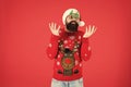 Hipster bearded man wear winter sweater and hat. New year. Knitted sweater. Happy new year. Christmas spirit. Funny Royalty Free Stock Photo