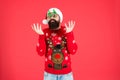 Hipster bearded man wear winter sweater and hat. New year. Knitted sweater. Happy new year. Christmas spirit. Funny Royalty Free Stock Photo