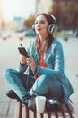 Hipster beautiful girl listening music Royalty Free Stock Photo