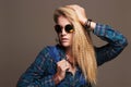 Hipster blond girl in sunglasses.beautiful young woman Royalty Free Stock Photo