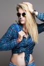 Hipster blond girl in sunglasses.beautiful young woman Royalty Free Stock Photo
