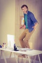 Hipster businessman standing on his chair Royalty Free Stock Photo