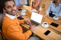 Hipster businessman using a laptop Royalty Free Stock Photo