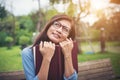 Hipster charming girl thinking something while reading red book Royalty Free Stock Photo