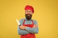 Hipster cook chopping and dicing using professional knife